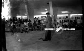 Seorang pejabat sedang memberikan  sambutan pada bursa perdagangan CEFI  (Center For Economical F...